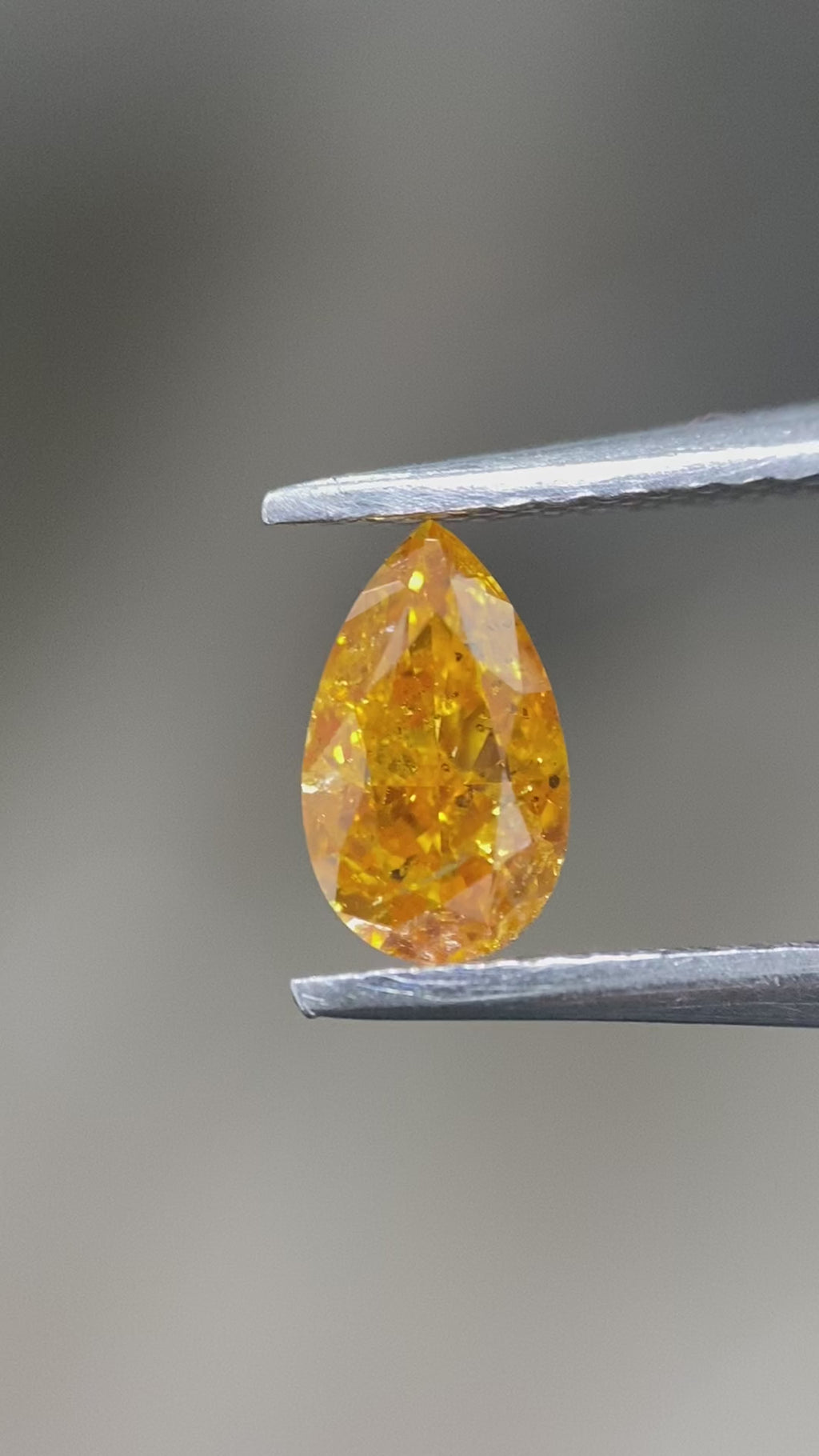 Video of Natural Diamond Pear 1.00 ct – Fancy Vivid Yellow-Orange, Natural Colour