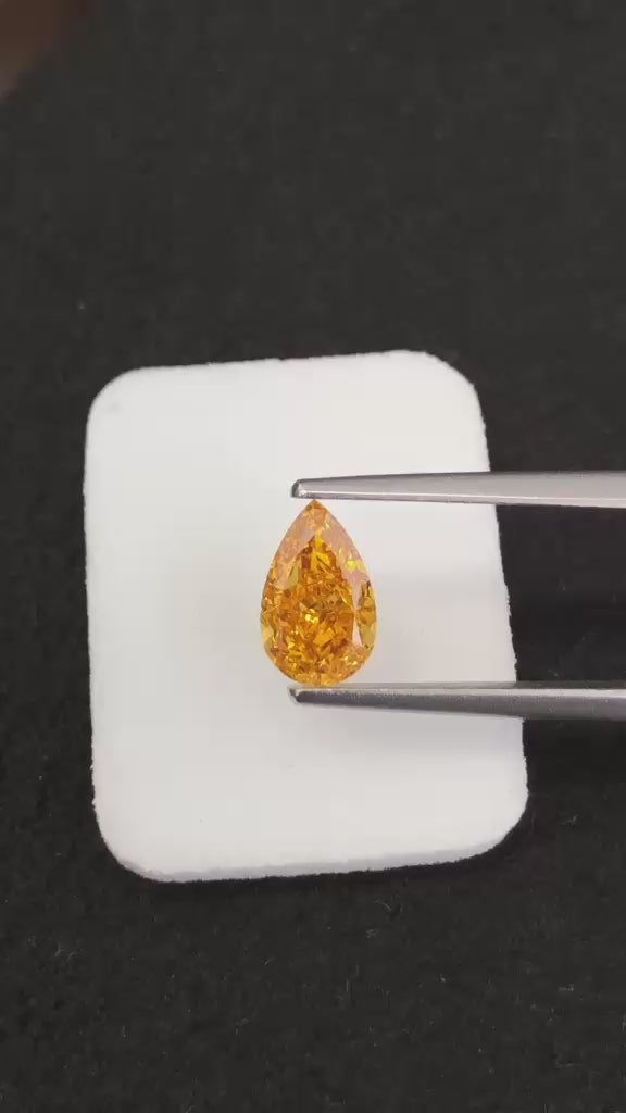 Video of Natural Diamond Pear 1.00 ct – Fancy Vivid Yellow-Orange, Natural Colour